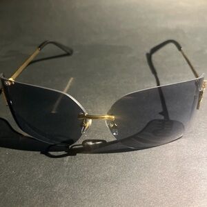 Miu Miu Gold and Black Rimless Sunglasses